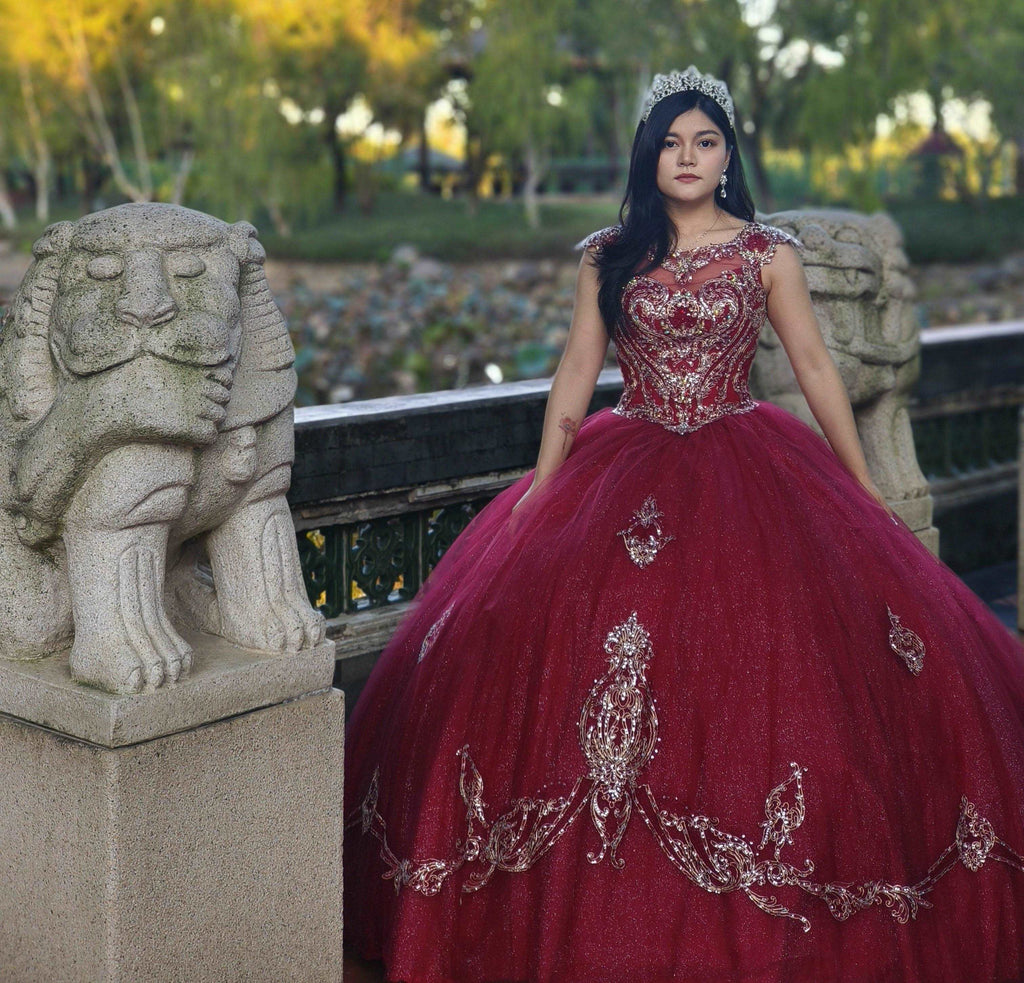 A beautiful gown, off-shoulder, reveals noble air.