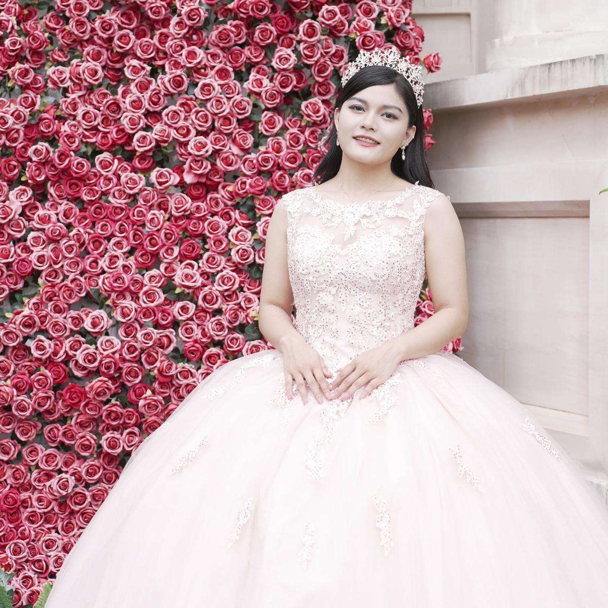 Adults in gowns, flowing skirts, confident display.