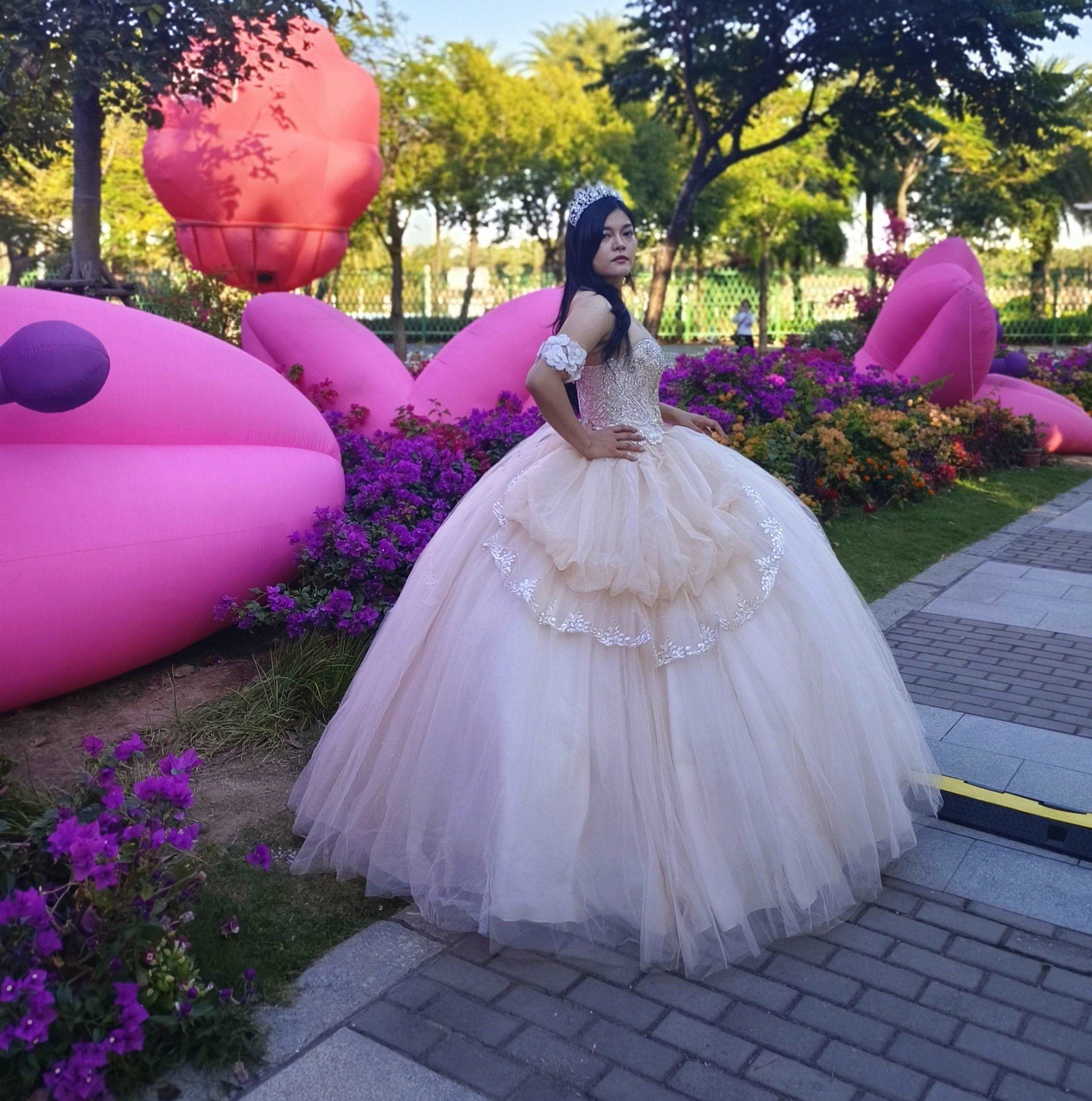 (LIVE 48) Adults in gowns, flowing skirts, confident display.