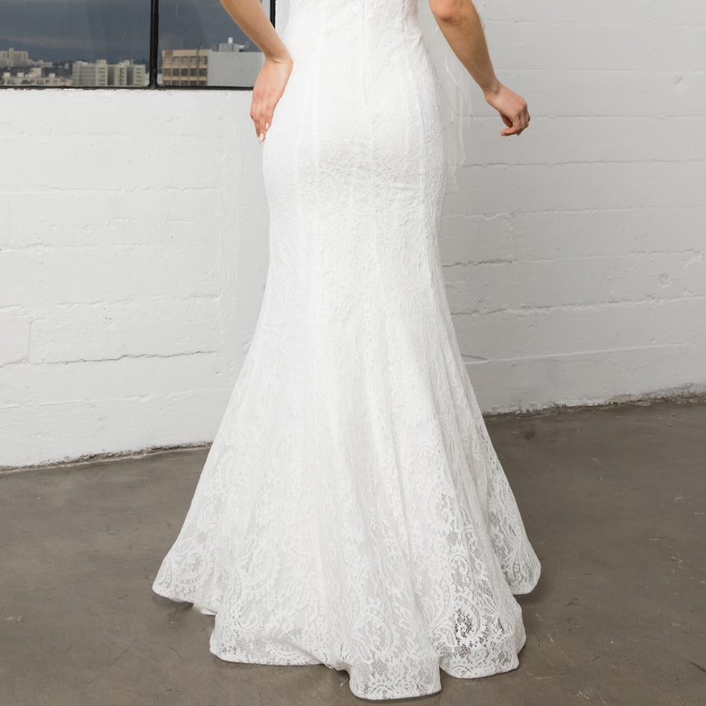 Gowns on, mermaid style, fashionable presence.