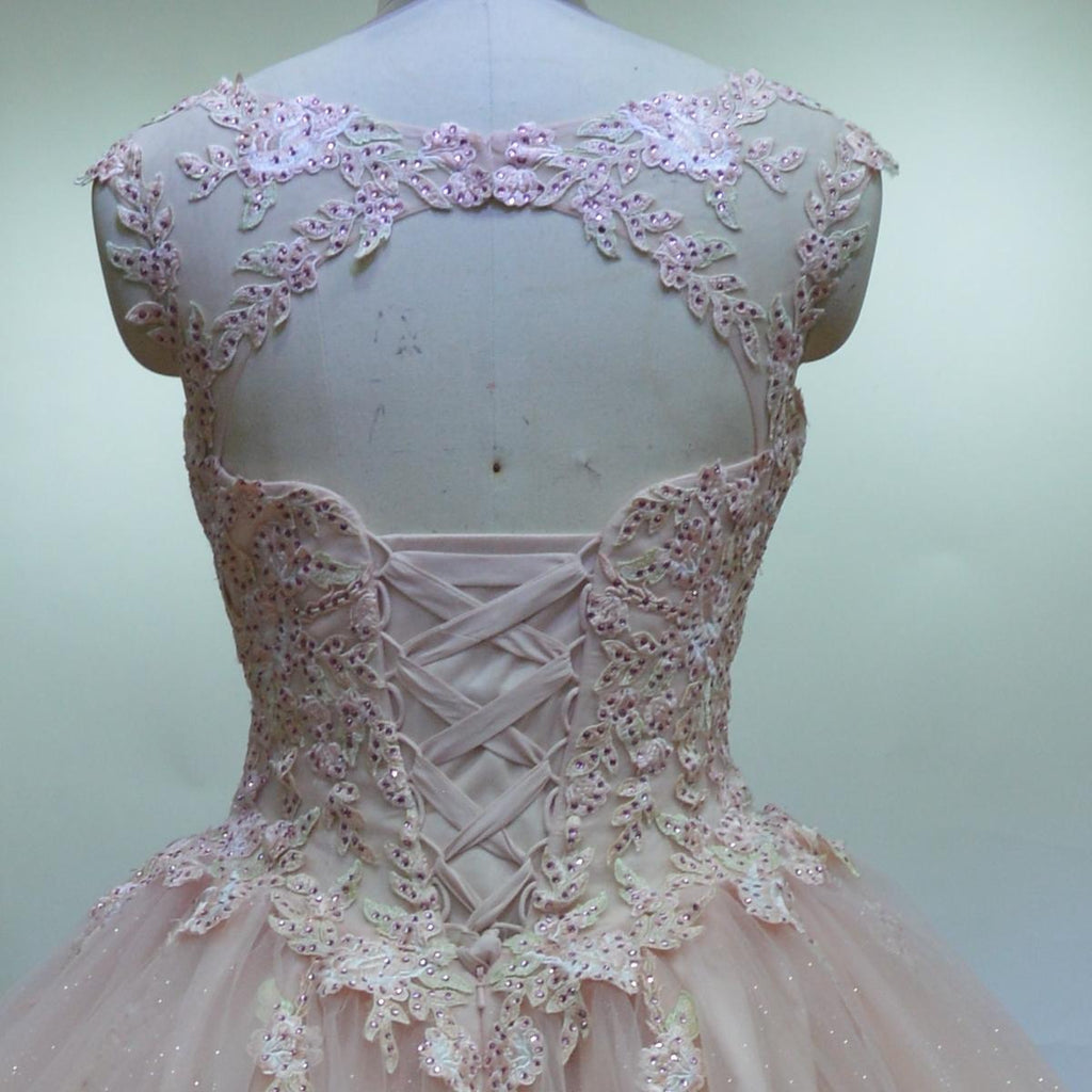 Adults in gowns, flowing skirts, confident display.