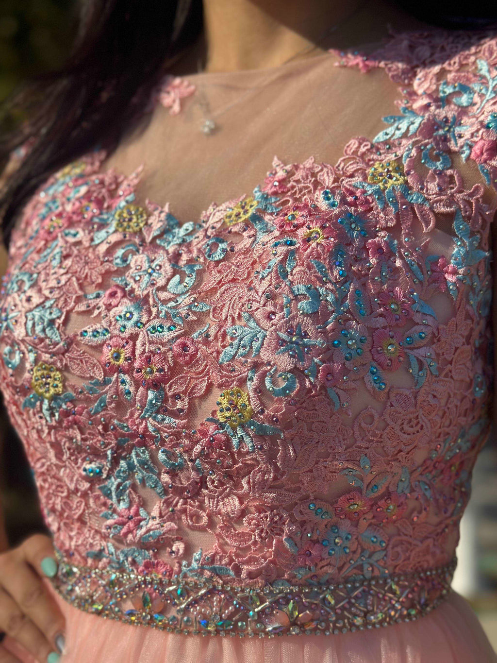 A beautiful gown, off-shoulder, reveals noble air.