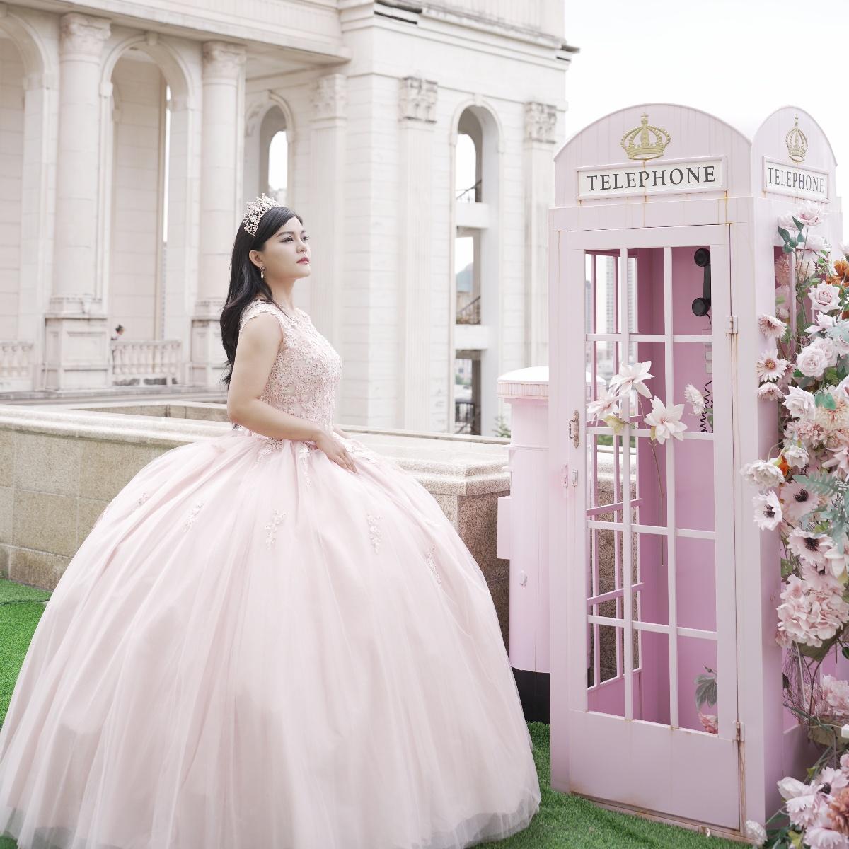 Adults in gowns, flowing skirts, confident display.